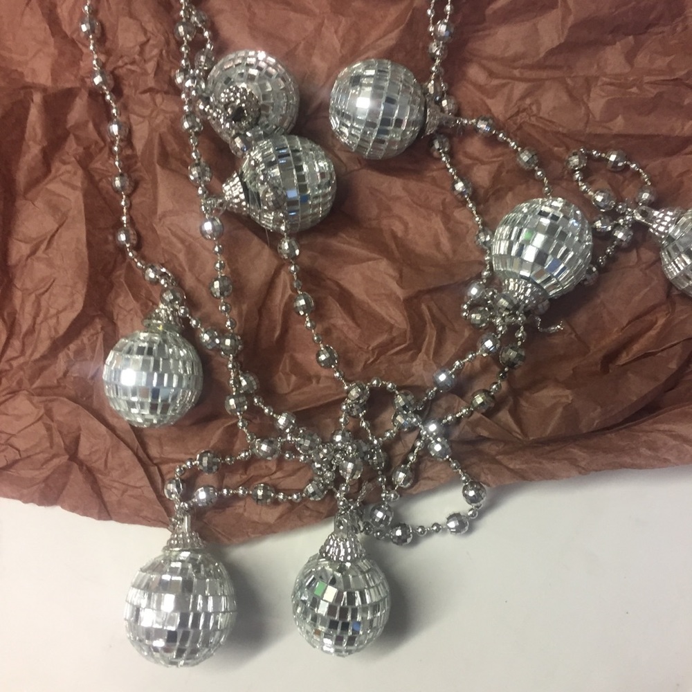 8 ft Strand of silver disco balls